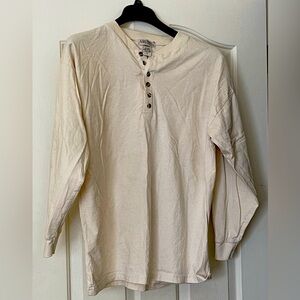 Man’s long sleeve T-Shirt. 27”neckline to tail. 24” across the chest.Sleeves 21”